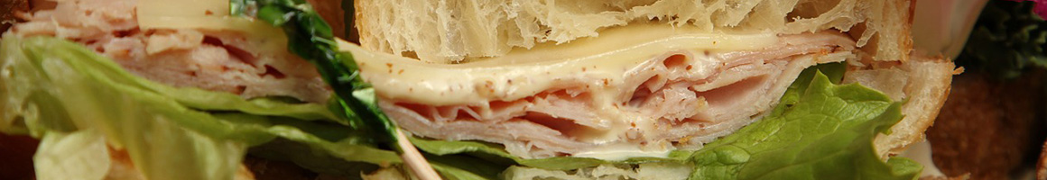 Eating Sandwich at Hancock Street Cafe restaurant in San Diego, CA.